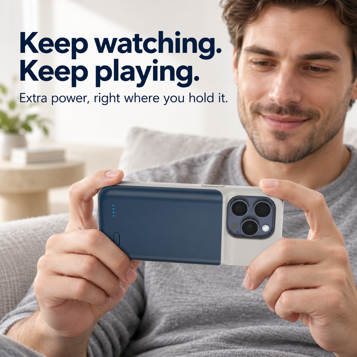 Blue battery case held in landscape orientation for everyday entertainment.